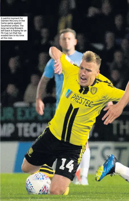  ??  ?? A painful moment for Damien McCrory in the home game against Southend United. The long-serving Brewers left-back is hoping for an FA Cup run that has evaded him in his time at the club.