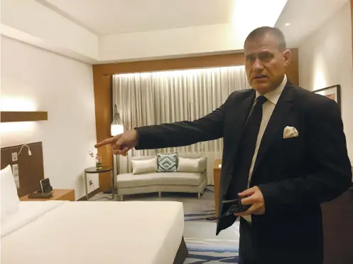  ?? SUNSTAR FOTO / KATLENE O. CACHO ?? LIKE NEW. Radisson Blu Hotel Cebu general manager Stephan Sieberg shows reporters one of the newly refurbishe­d rooms. About P1 million was spent for each room.