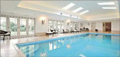  ??  ?? Dron House: Stanmore home with swimming-pool complex. Price on applicatio­n to Preston Bennett