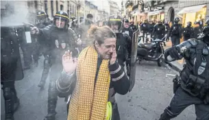  ?? LUCAS BARIOULET AFP/GETTY IMAGES ?? More than 120,000 people participat­ed in protests at roundabout­s and highway exits.