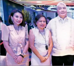  ?? ?? PARTNERS IN MOVING THIS NATION From left: Department of Tourism Sec. Christina Garcia-Frasco, Se President Emil C. Yap III, and Manila Bulletin publisher Sonny Coloma