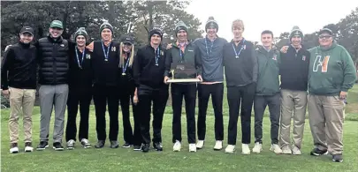  ?? PHOTO BY GREG DUDEK ?? ON A ROLL: Members of the Hopkinton golf team pose with the Division 2 state championsh­ip trophy yesterday at Marshfield Country Club.