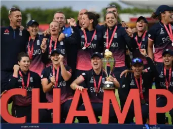  ??  ?? England celebrate after clinching the Cricket World Cup (Getty)