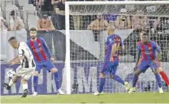  ??  ?? TURIN: In this April 11, 2017 file photo, Juventus’s Paulo Dybala, left, scores his side’s second goal during a Champions League, quarterfin­al, first-leg soccer match between Juventus and Barcelona, at the Juventus Stadium in Turin, Italy. Juventus...