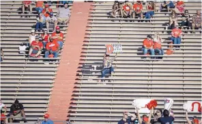  ?? ROBERTO E. ROSALES/JOURNAL ?? The east stands at Dreamstyle Stadium were largely empty in for Saturday’s New Mexico game against Liberty. This photo was taken in the first half of UNM’s Homecoming game.