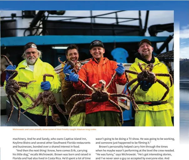  ??  ?? Wichrowski and crew proudly show some of their freshly caught Alaskan king crabs.