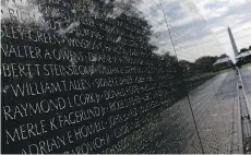  ?? WIN MCNAMEE/GETTY IMAGES ?? The Vietnam Veterans Memorial is a poignant landmark in Washington D.C. “I came back in basically one piece,” says Ridgeway. “I came back able to live my life.”