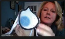  ?? IMAGE VIA ZOOM CONFERENCE CALL ?? Samantha Partovi, owner of Ramshield Inc., shows the new AV Shield facemask during a zoom conference call. The mask is a “first of its kind” that has just gone into production. Partovi’s company is one of the distributo­rs.