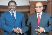  ?? Picture: AFP ?? SHAKY DEAL: DRC President Joseph Kabila, left, shakes hands with President Jacob Zuma at Sefako Makgatho Presidenti­al Guest House in Pretoria yesterday