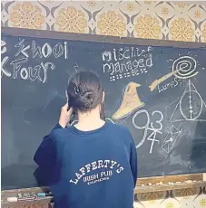 ??  ?? The children collaborat­ed on this week’s blackboard design.