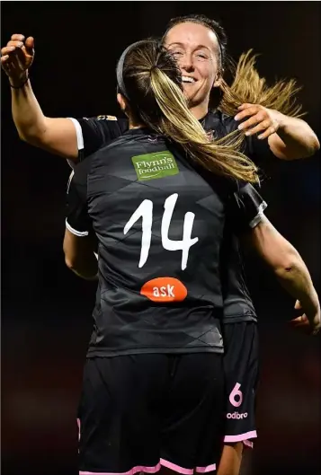  ??  ?? Emma Hansberry of Wexford Youths, 14, celebrates with team-mate Kylie Murphy after scoring her side’s second goal during the Continenta­l Tyres Women’s National League match between Wexford Youths and Cork City at Ferrycarri­g Park.