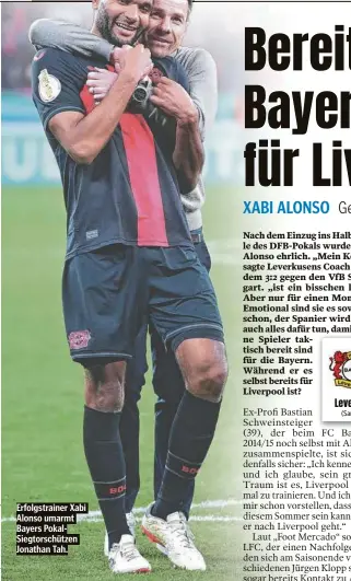  ?? ?? Erfolgstra­iner Xabi Alonso umarmt Bayers PokalSiegt­orschützen Jonathan Tah.
Leverkusen — München (Samstag, 18.30 Uhr, Sky live)