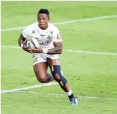  ?? Picture: GALLO IMAGES/STEVE HAAG ?? STRONG START: Sbusiso Nkosi of the Sharks on the charge during the PRO14 Rainbow Cup SA match against the Lions at Kings Park on Saturday.