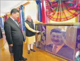  ?? PTI ?? PM Narendra Modi with Chinese President Xi Jinping in Kovalam near Mamallapur­am on Saturday.