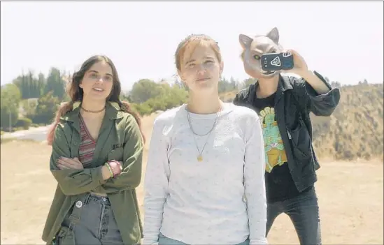  ?? Orchard ?? ERICA (Zoey Deutch, center) and her best friends (played by Maya Eshet, left, and Dylan Gelula) await their next victim in the off-the-wall tale “Flower.”