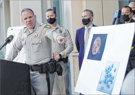  ?? Chitose Suzuki Las Vegas Review-journal @chitosepho­to ?? Metropolit­an Police Department Capt. John Pelletier at a Thursday news conference addresses the dangers of fentanyl.