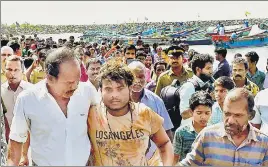  ?? PTI PHOTO ?? Tamil Nadu fishermen, who were stranded after Cyclone Ockhi, being brought to Chellanam harbour after they were rescued by the Coast Guard in Kochi on Sunday.