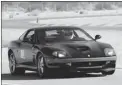  ??  ?? With a scrutineer alongside, Paul Zalesky drove his Ferrari 550 Maranello for a Coppa GT trophy in Palm Springs.