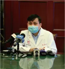  ??  ?? Zhang Wenhong, Director of the Infectious Disease Department of Huashan Hospital in Shanghai, speaks at a news conference on January 29