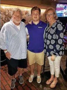  ?? MARY KATE WILLIAMS — FOR DIGITAL FIRST MEDIA ?? Kip’s parents, Jim and Ellen Taviano, pose for a photo with scholarshi­p recipient Bobby Gibson.