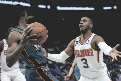  ?? AP PHOTO/PAUL SANCYA ?? Phoenix Suns guard Chris Paul (3) defends Detroit Pistons guard Jaden Ivey (23) in the second half of an NBA basketball game in Detroit, on Saturday.