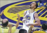  ?? AP FILE ?? Stephen Curry yells after the Warriors defeated the Oklahoma City Thunder in Game 7 of the 2016 NBA Western Conference final in Oakland, California. On Saturday, Curry signed a new $201 million deal with the Warriors.