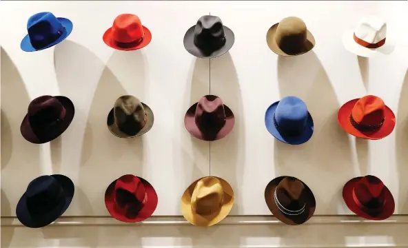  ?? PHOTOS: ANTONIO CALANNI/THE ASSOCIATED PRESS ?? Italian hatmaker Borsalino was once synonymous with the fedora — none more famous than the one worn by Humphrey Bogart.