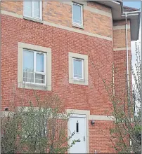  ??  ?? Police stand guard outside the Hagley Road flat and, right, Masood’s home in Winson Green