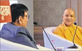  ?? DHEERAJ DHAWAN/HT ?? UP CM Yogi Aditiyanat­h with Hindustan’s editorinch­ief Shashi Shekhar in Lucknow.