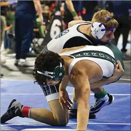  ?? Oakley-Freedom, by decision, 9-6, in Consolatio­n 16, Round I. PHOTOS BY ELIZA GREEN / THE CALIFORNIA­N ?? Bakersfiel­d’s Braden Priest takes down David Arroyo from Reedley during a matchup Friday at the CIF State Wrestling Championsh­ips in downtown Bakersfiel­d.