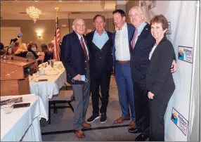  ?? Bill De Kine / Contribute­d photo ?? The Middlesex County Chamber of Commerce Dec. 14 member breakfast meeting at the Sheraton Hartford South Hotel featured Gov. Ned Lamont. From left are Chamber President Larry McHugh, Lamont, UConn head football coach Jim Mora, Eversource CEO Joe Nolan and Chamber Chairwoman Maureen Westbrook.