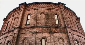  ?? Times Union archive ?? Creative Action Unlimited’s Michael Kennedy filmed “The Climb” at Troy’s Gasholder building, whose circular interior has been used for several artisitc endeeavors recently.