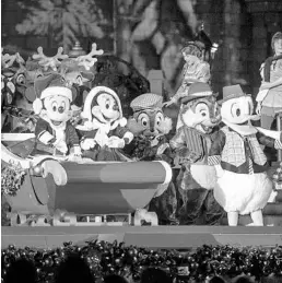  ?? WALT DISNEY WORLD ?? Walt Disney World has canceled the 2020 edition of Mickey’s Very Merry Christmas Party and Epcot’s Candleligh­t Procession­al, but other holiday happenings are in store.