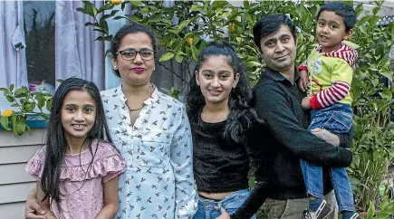  ?? STACY SQUIRES/STUFF ?? Nepalese refugees, from left, Babita, 8, Prativa (mother), Biplata 15, Bishhnu (father) and and Bipul, 3, arrived in Christchur­ch in late 2006 after fleeing Nepal in 2005 due to civil unrest.