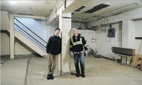  ?? LARRY WONG ?? Scott Ashe, left, city heritage planner, and Butch Balch, LRT Maintenanc­e co-ordinator, check out the basement of Street Railway Substation No. 600 on Tuesday. The city wants to give the 79-year-old art building heritage status to protect it before it...