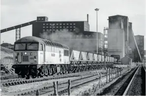  ??  ?? RIGHT: This time it’s Woolley Colliery on October 28, 1988 as 56123 leads its train
beneath the loading bunker before heading to Drax. (Ivan Stewart
Collection)