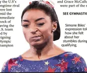  ??  ?? Simone Biles’
expression told how she felt about her stumbles during qualifying.