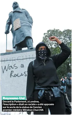  ?? PHOTOS AFP ?? Royaume-uni
Devant le Parlement, à Londres, l’inscriptio­n « était un raciste » a été apposée sur le socle de la statue de l’ancien premier ministre Winston Churchill.