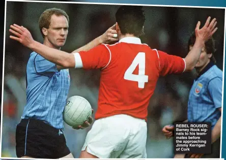  ?? ?? REBEL ROUSER: Barney Rock signals to his teammates before the approachin­g Jimmy Kerrigan of Cork