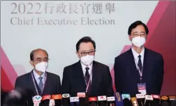  ?? CALVIN NG / CHINA DAILY ?? Chairman of the Electoral Affairs Commission Barnabas Fung Wah (center) said the election was conducted in an open, just and honest manner during a media briefing after the election.