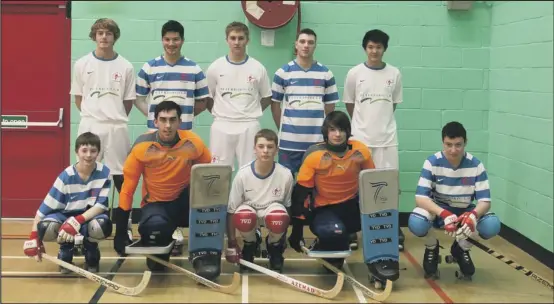  ??  ?? ROLLING THEIR WAY TO NATIONAL RECOGNITIO­N: That’s Oliver Johnson (back middle), Sam Cayley (front second left), Matt Stearn (front second right) and Michael Carter (front right), who are pictured with their Peterborou­gh Roller Hockey Club team-mates.