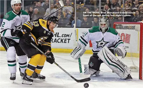  ?? STAFF PHOTO BY MATT STONE ?? ON THE MOVE: Brad Marchand maneuvers in front of the net during last night’s game.