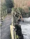  ??  ?? A footbridge in Blackmill was damaged after being hit by a fallen tree in the river