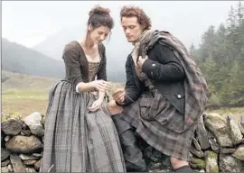  ?? Nick Briggs
Starz ?? CAITRIONA BALFE is cast back in time in “Outlander,” with Sam Heughan.