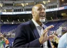  ?? LYNNE SLADKY — THE ASSOCIATED PRESS FILE ?? In this file photo, Tony Clark, head of the MLB Players Associatio­n, stands on the field before the All-Star Futures baseball game in Miami.