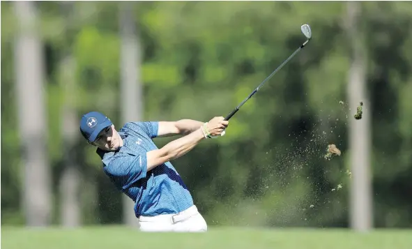  ?? — GETTY IMAGES ?? Jordan Spieth plays a shot on his nemesis — the 12th hole — during the third round of the Masters Saturday in Augusta.