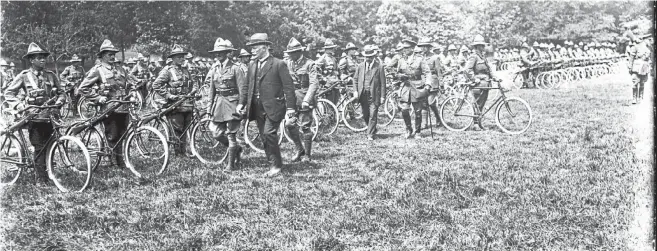  ?? ALEXANDER TURNBULL LIBRARY ?? New Zealand PM William Massey and his deputy Joseph Ward inspect the New Zealand Cyclist Battalion in France, July 3 1917.