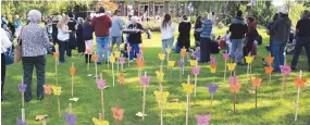  ??  ?? MESSAGES OF HOPE, HELP &amp; HEALING FROM THE COMMUNITY WRITTEN ON BUTTERFLIE­S AS PART OF WORLD SUICIDE PREVENTION DAY IN VICTORIA PARK