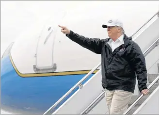  ?? AP PHOTO ?? President Donald Trump gestures after arriving at McAllen Internatio­nal Airport for a visit to the southern border in McAllen, Texas, last week.