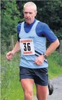  ??  ?? ●● Graham Wright, of Rossendale Harriers, has been awarded a British Empire Medal